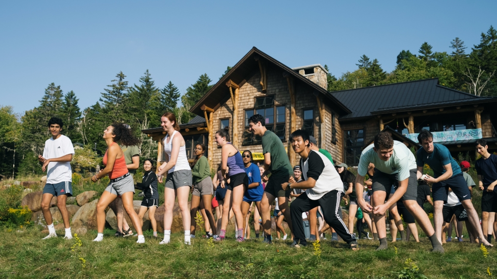 Students dancing outside the Moosilauke Ravine Lodge